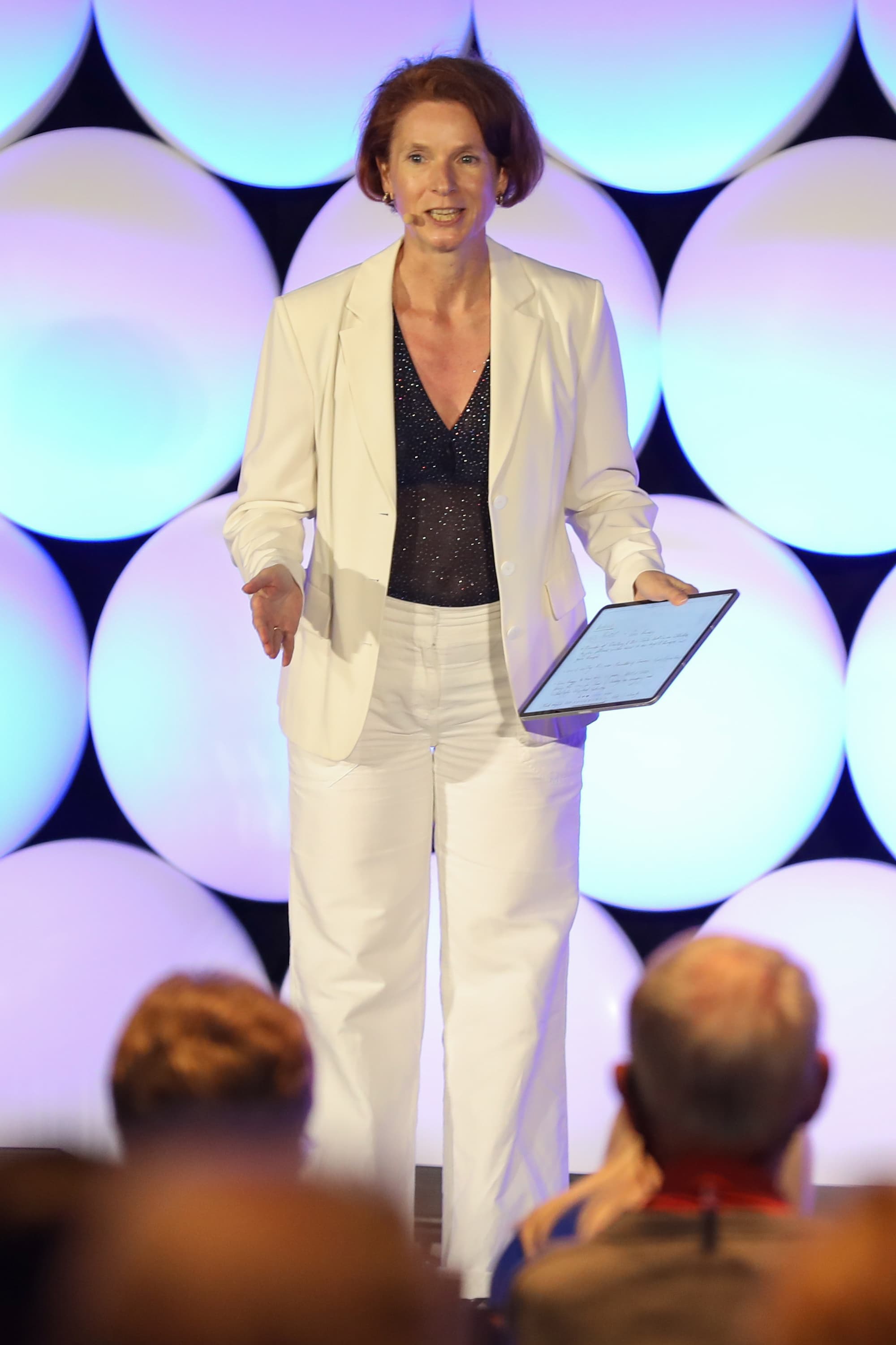 Dr. Ines O'Donovan speaking to a live audience